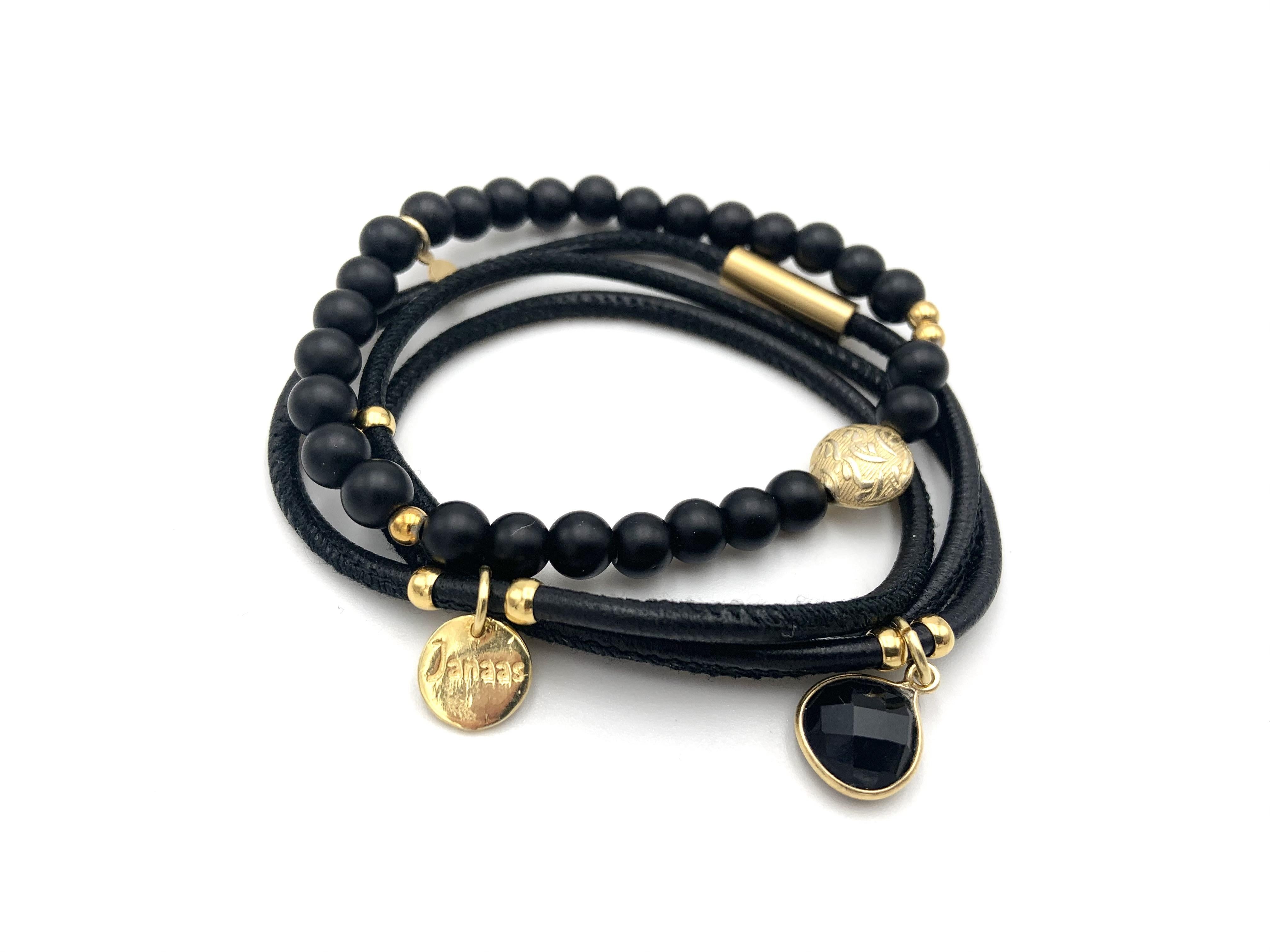 Armband Onyx matt M mit goldener Ornamentperle