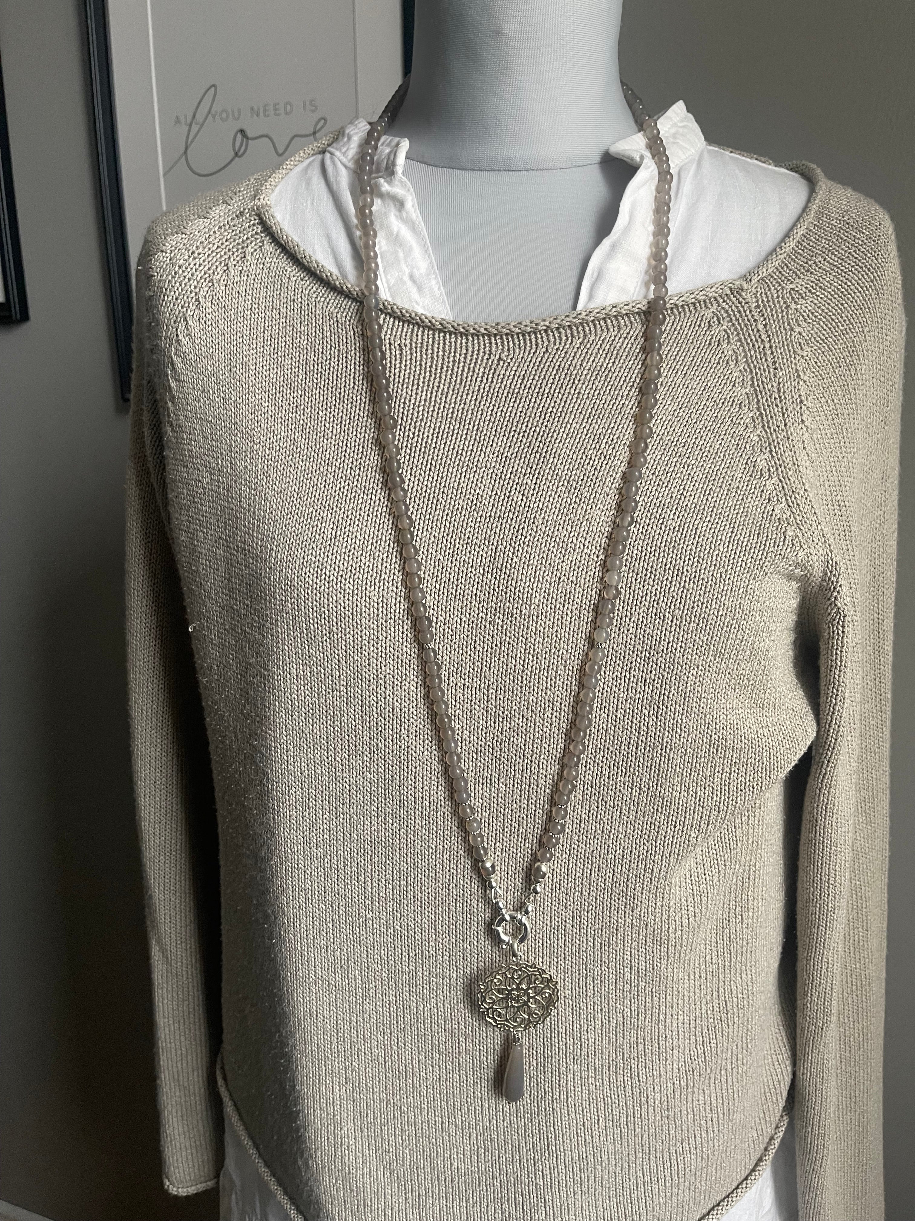 Lange Achat Kette grau